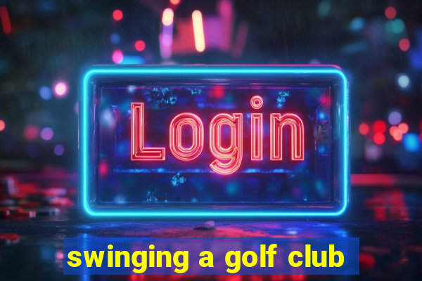 swinging a golf club